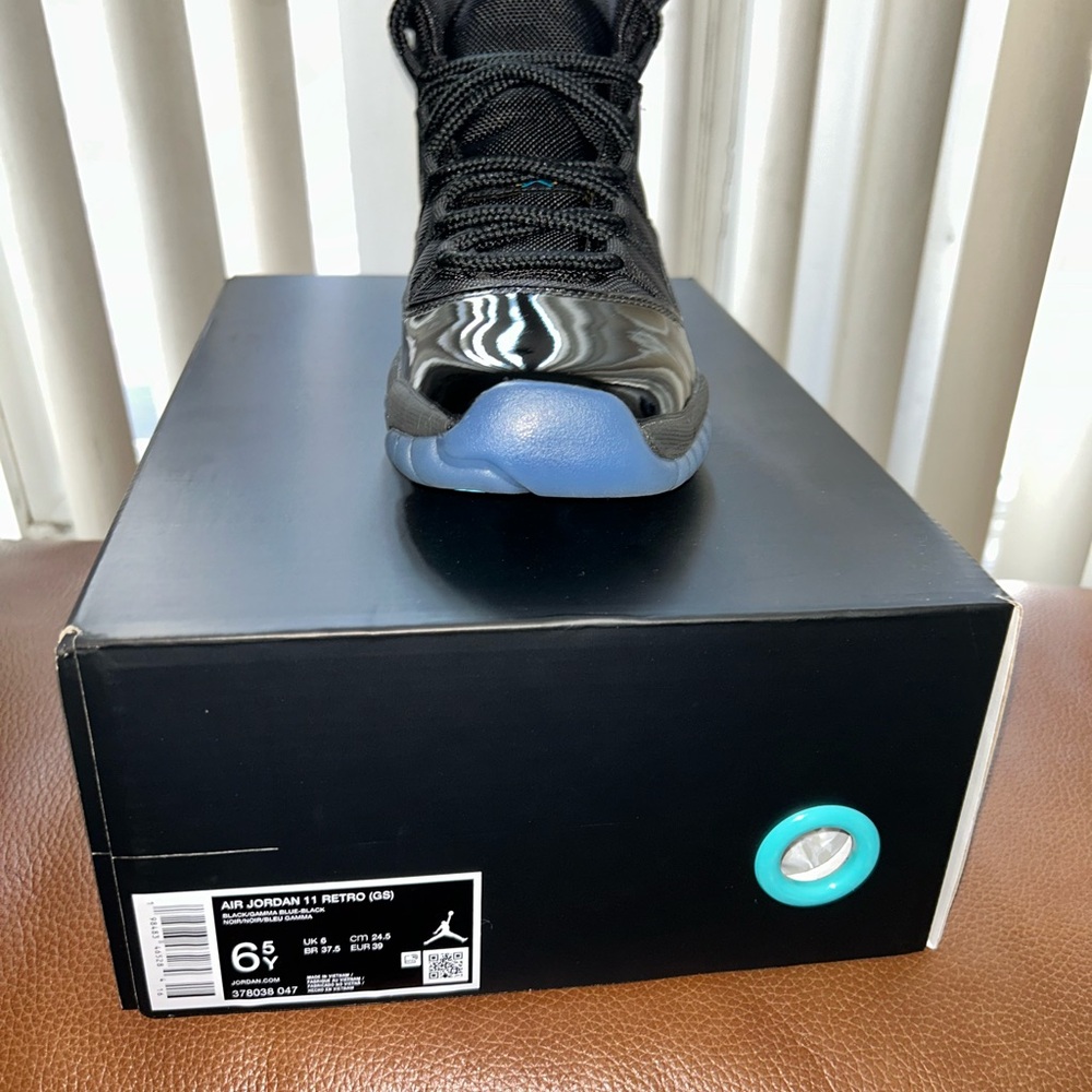 Jordan 11 Retro Black and Blue Sneakers